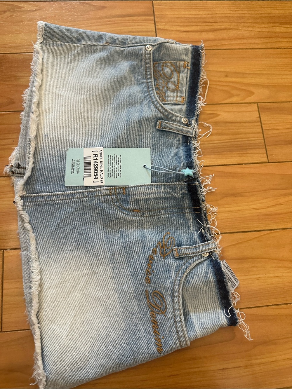 Embroidered Light Wash Denim Mini Skirt